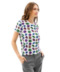 Woman wearing the All Eyes On Me Print Tee, a white cotton crew neck shirt with a colorful all-over print of various symbolic eyes and mystical motifs, styled with gray pants.
