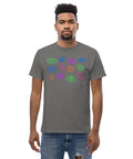 Man wearing a charcoal "All Eyes On Me Tee" made of premium heavyweight fabric featuring a colorful array of abstract eye designs across the chest, styled in a dark feminine aesthetic.