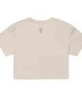 Back view of a cream-colored All Eyes on Me Crop Top made from 100% combed cotton, featuring a relaxed fit, cropped length, and a small decorative golden design near the neckline.