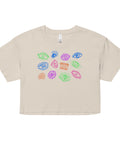 All Eyes on Me Crop Top in soft, lightweight combed cotton featuring colorful, whimsical eye symbols arranged in a playful pattern on a relaxed fit, cropped beige fabric.