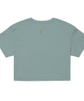 Back view of As Above, So Below Crop Top (White) in soft, lightweight combed cotton with a relaxed fit and cropped length, styled in a muted sage green tone.